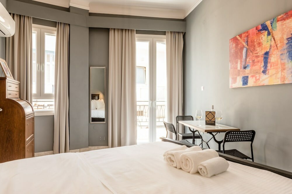 Фото The Central Boutique Αpartments