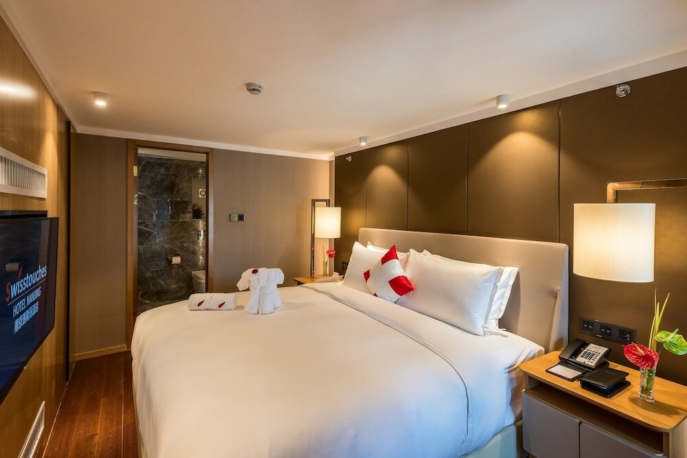 Фото Swisstouches Hotel Nanjing