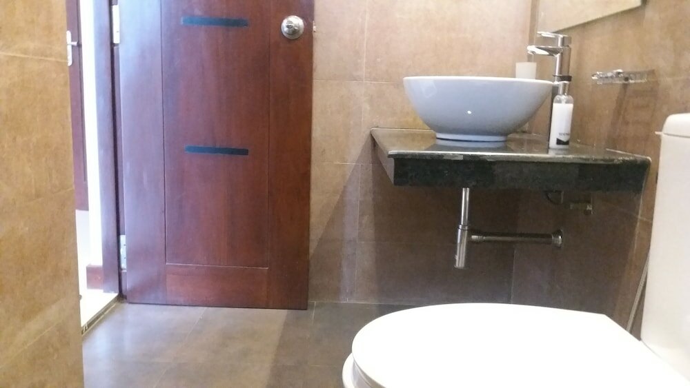 Фото Tj's Apartments