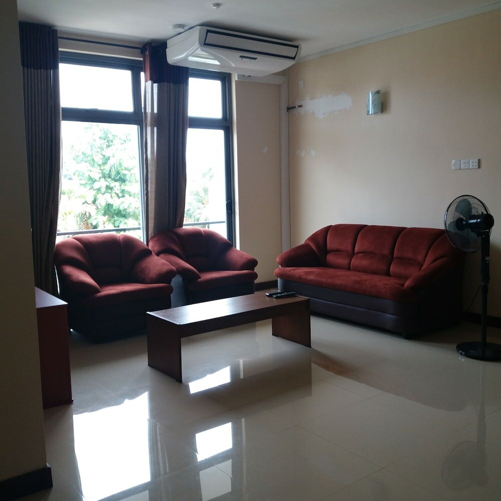 Фото Tj's Apartments