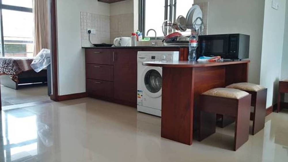 Фото Tj's Apartments