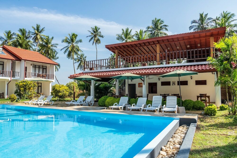 Фото Green Parrot Beach Resort