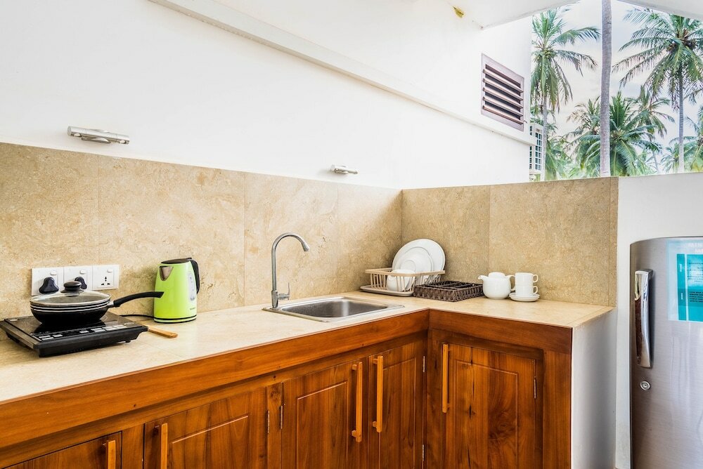 Фото Green Parrot Beach Resort