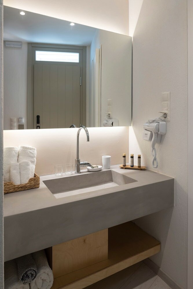 Фото L Anima Boutique Suites