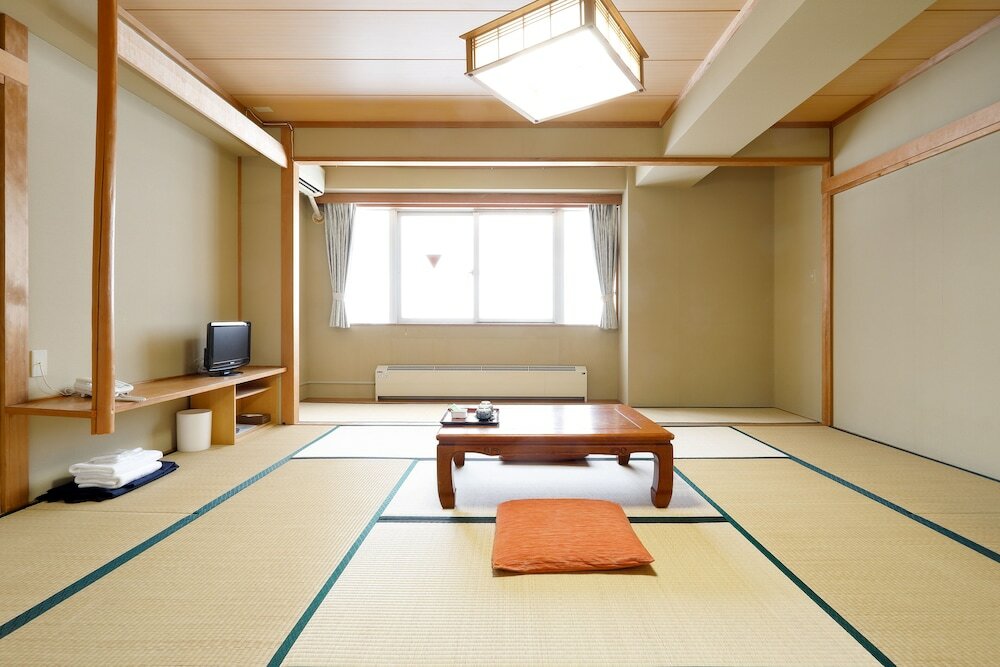 Фото Tsugaike Kanko Hotel