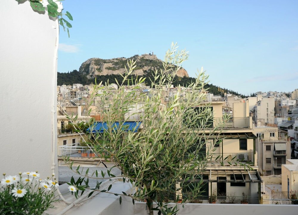 Фото Top of the city Central studio with Acropolis View
