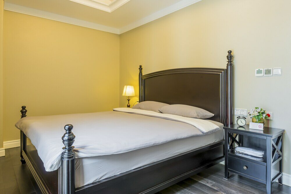 Фото Shanghai Xinchuan Boutique Apartment