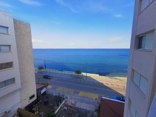 Апартаменты Flirty Flamingo Seaview Seafront Apartment в Ларнаке