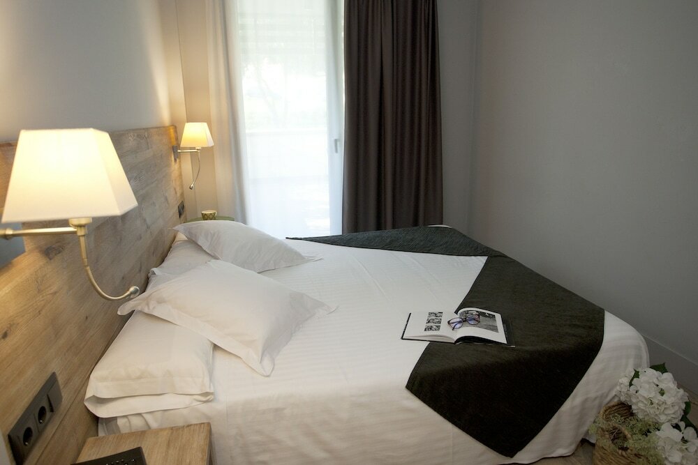 Фото Aparthotel Arrels d'Empordà