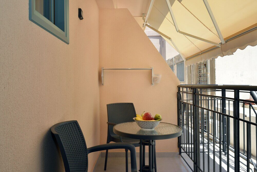 Фото Rex Apartments