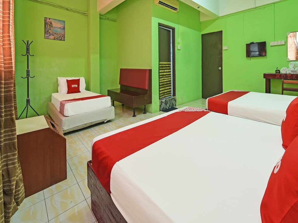 Фото Super Oyo Capital O 90659 Raintown Timbers Hotel