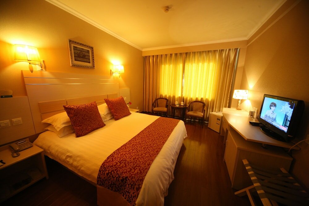 Фото Overseas Chinese International Hotel