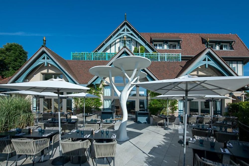 Фото Renaissance Paris Hippodrome De St. Cloud Hotel