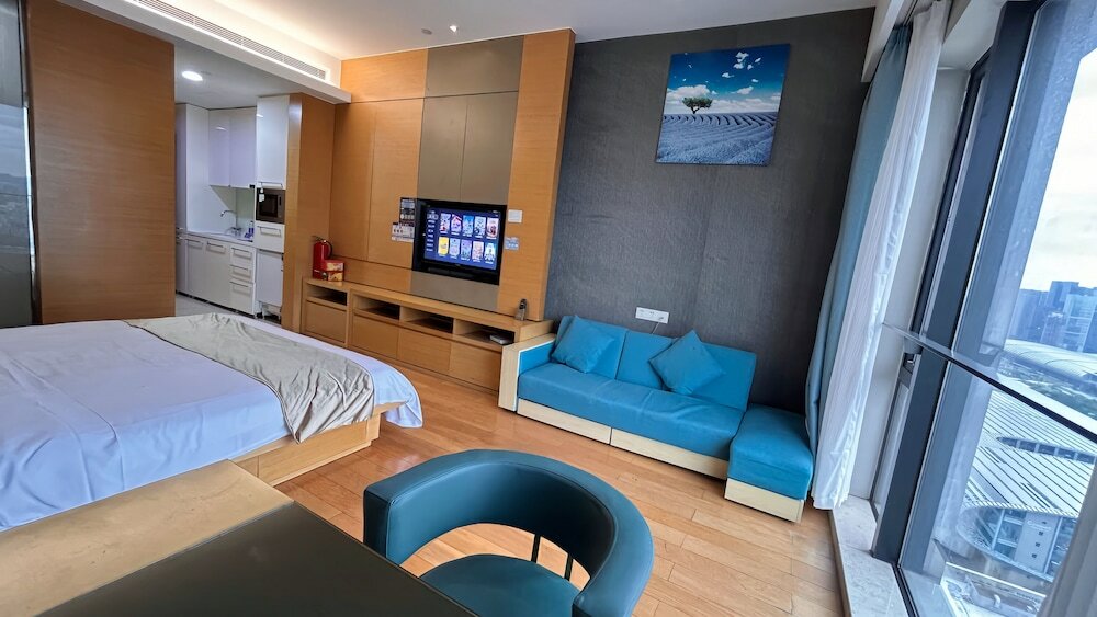 Фото Xingyi International Hotel Poly Store