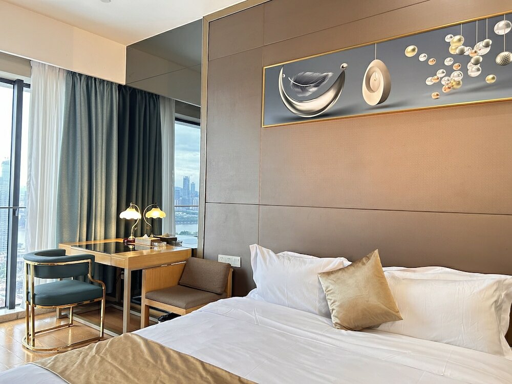 Фото Xingyi International Hotel Poly Store