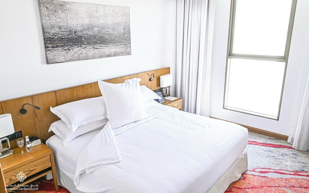 Фото Jasmine Garden Hotel