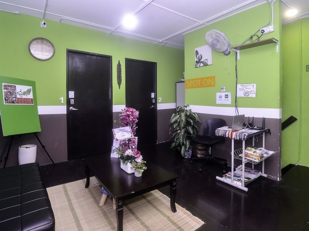 Фото Spot On 89929 Tropical Lodge