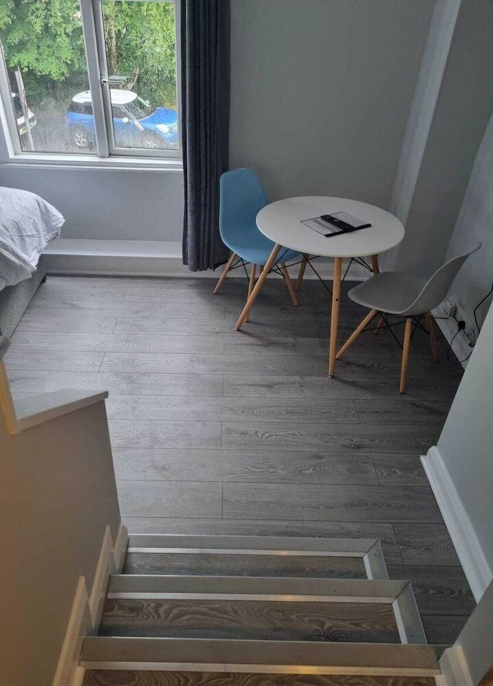 Фото Grey Stone Studio Apartments