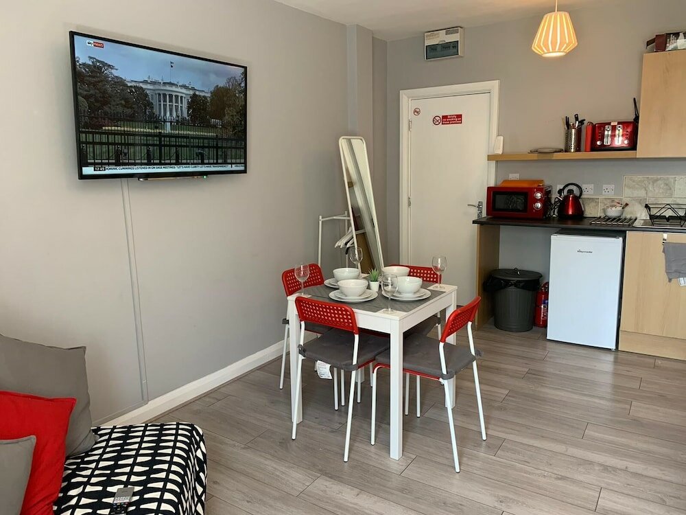 Фото Grey Stone Studio Apartments