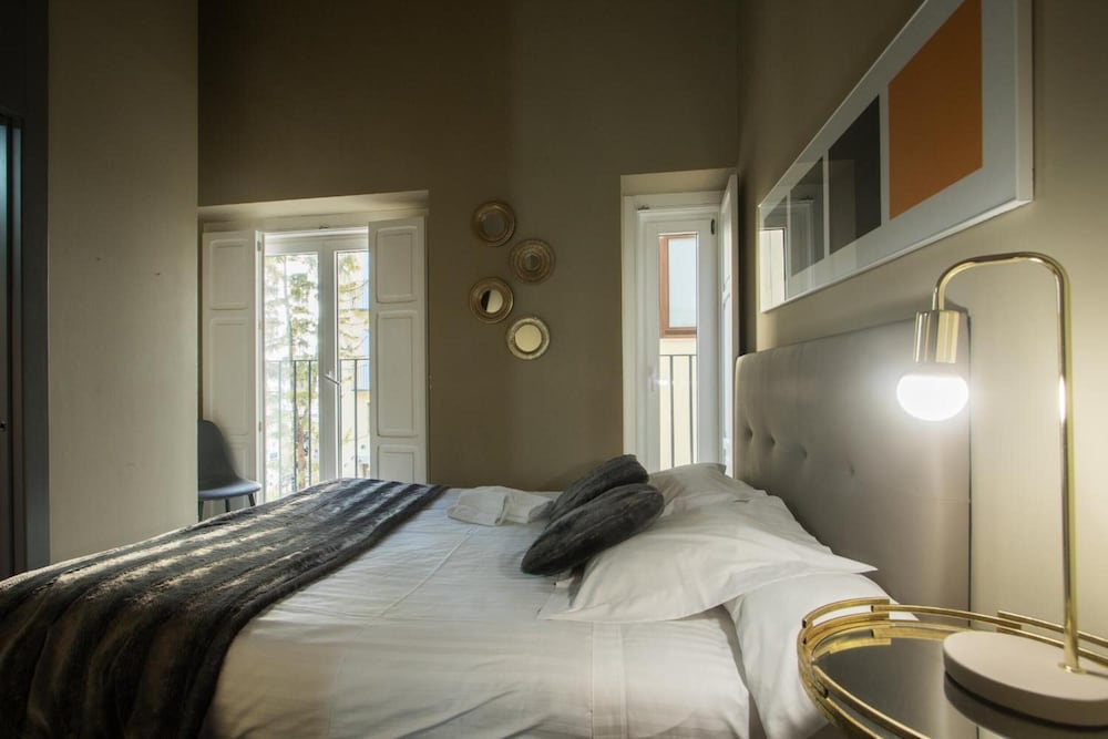 Фото Cosy Rooms Tapinería