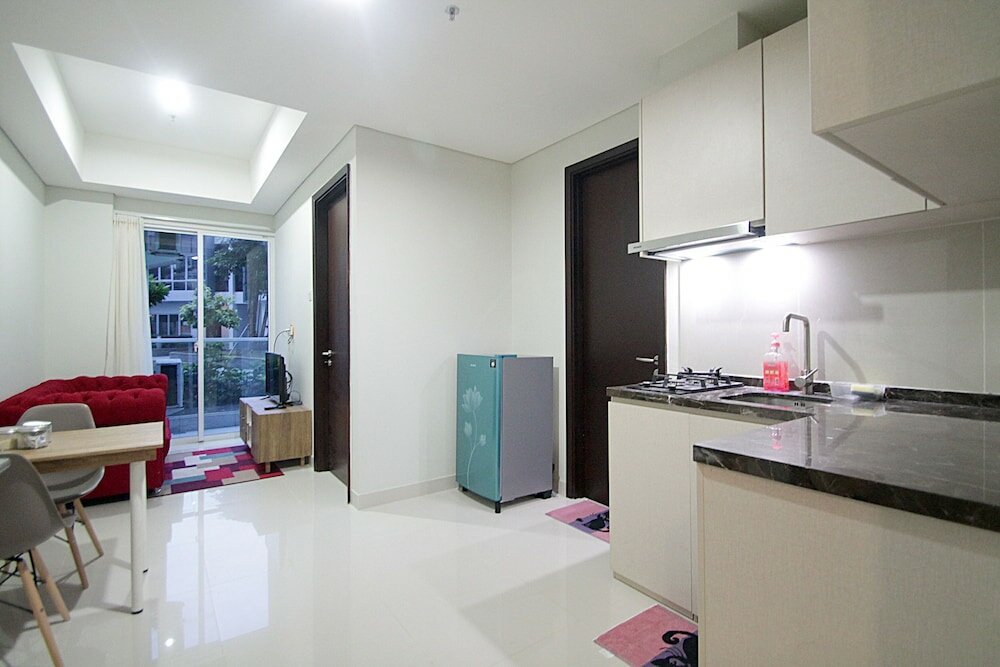 Фото Puri Mansion Apartment