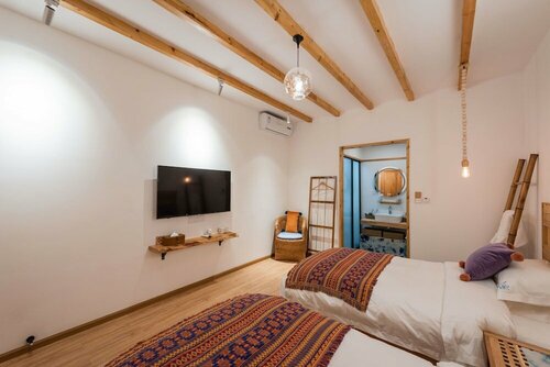 Гостиница Dali Orchard Suites в Дали
