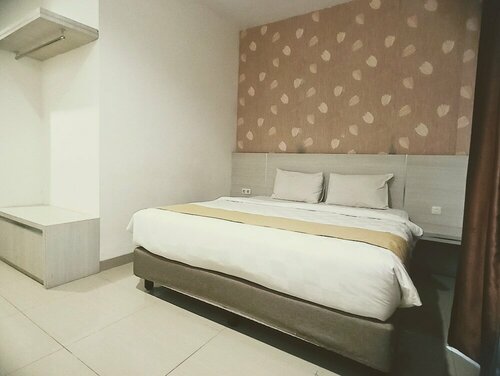 Гостиница Yunna Hotel Express Lampung в Бандар-Лампунге