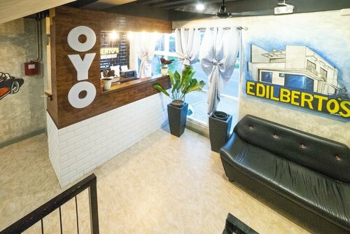 Гостиница Oyo 471 Edilberto's B&b в Тагуме