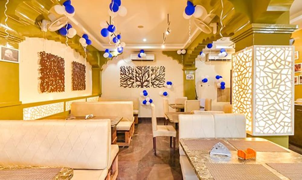 Фото Fabhotel Gns Suites