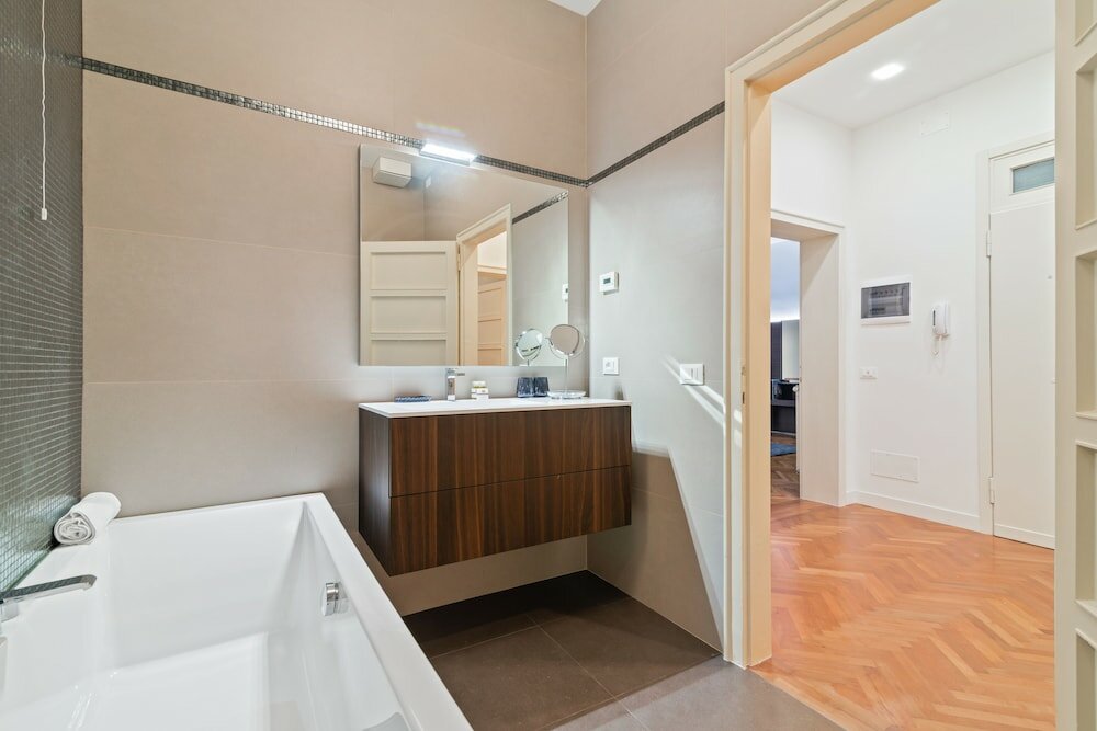 Фото San Fermo Luxury Apartment