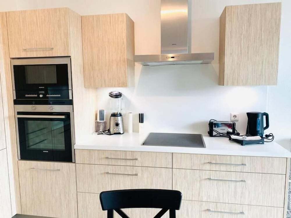 Фото Spac. Flat -Kirchberg w Parking&Terrace