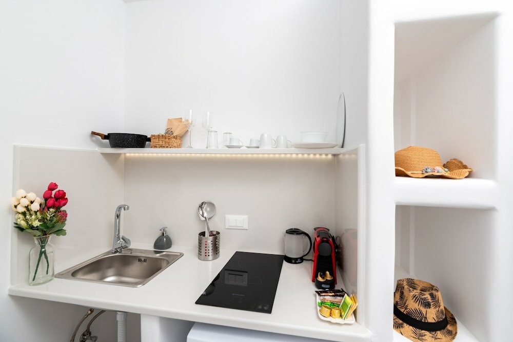 Фото Thallos Cave House and Apartments