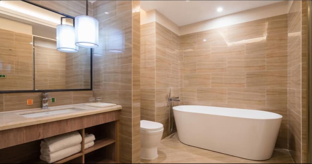 Фото Auden International Hotel