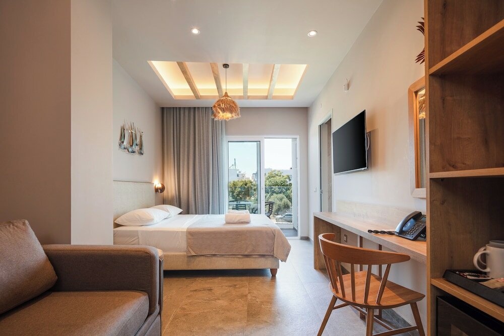 Фото Skipper Beachfront Suites