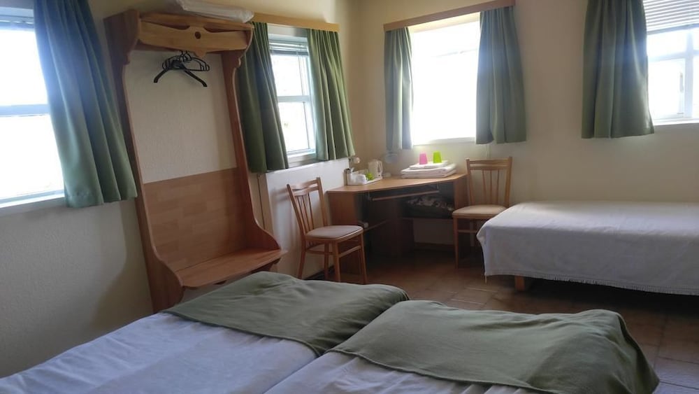 Фото Fosshóll Guesthouse