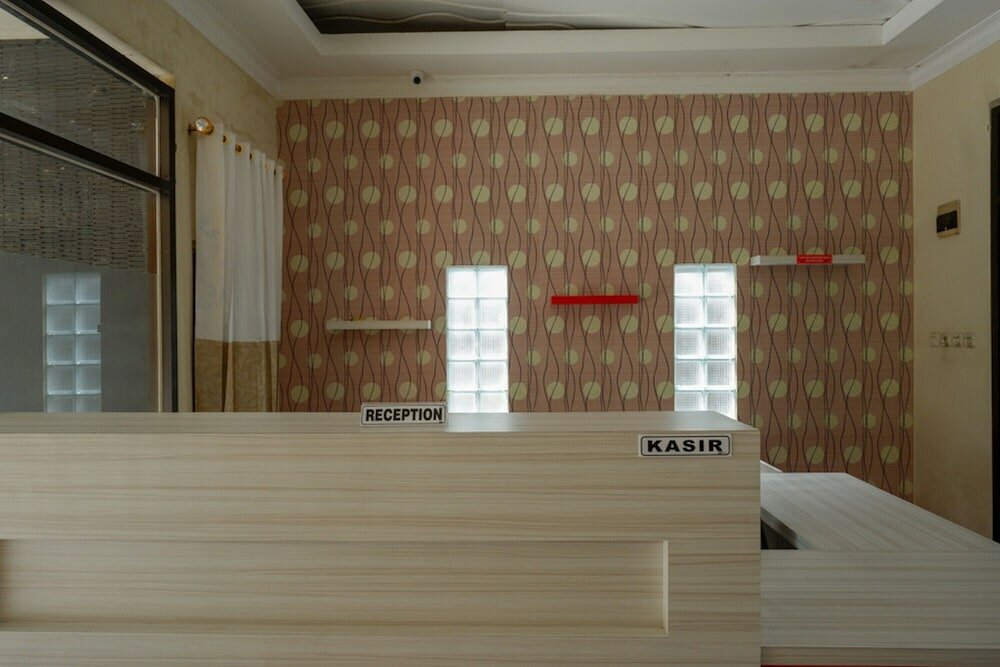 Фото RedDoorz near Millenium Waterpark Palu