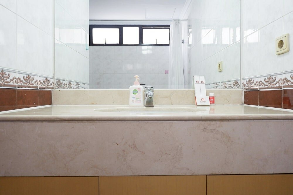 Фото 3BR Apartment at Sudirman Condominum Tower By Travelio