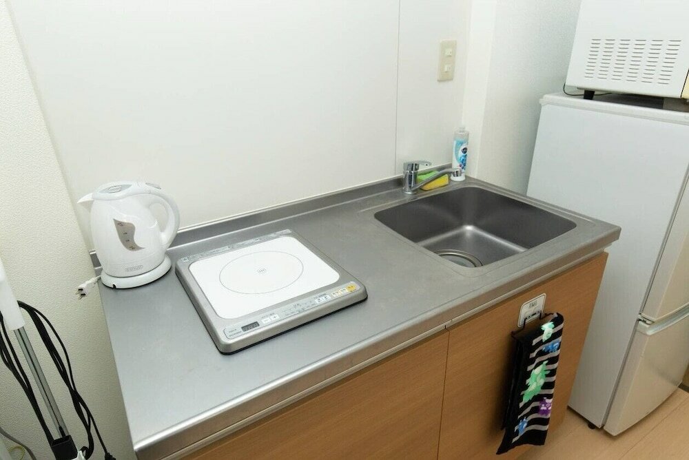 Фото Guesthouse Daikokucho Ekimae