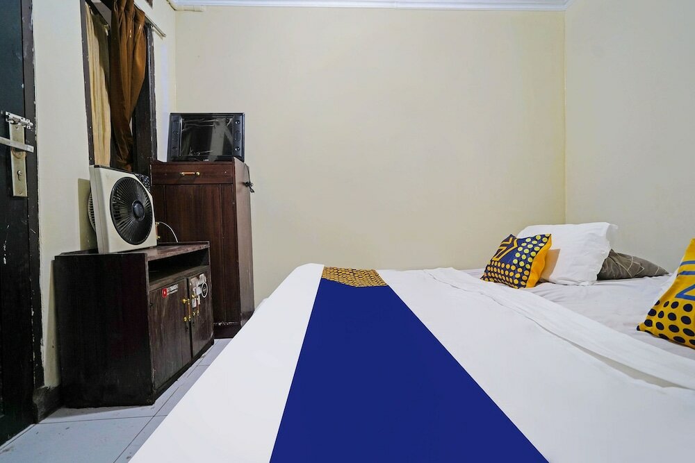 Фото Spot On 91783 Urban Syariah Residence