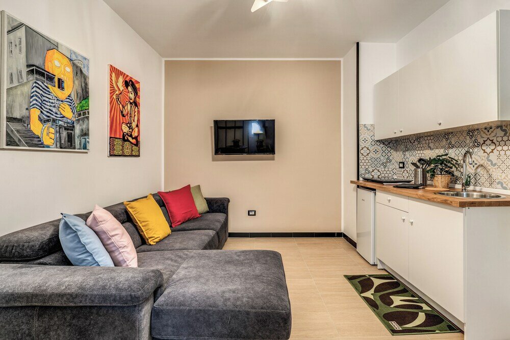 Фото The Quarters Naples Apartment