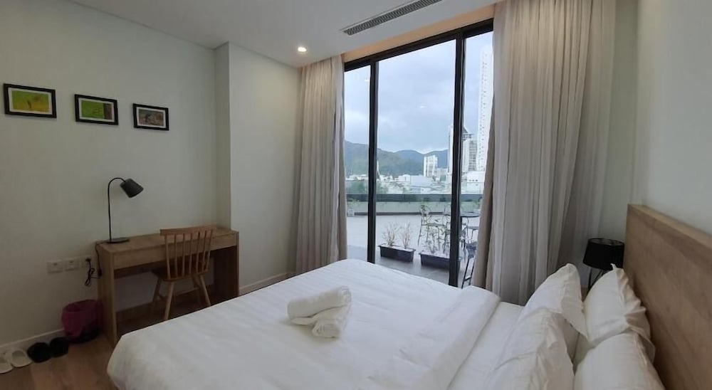 Фото Wise Stay Scenia Bay Nha Trang