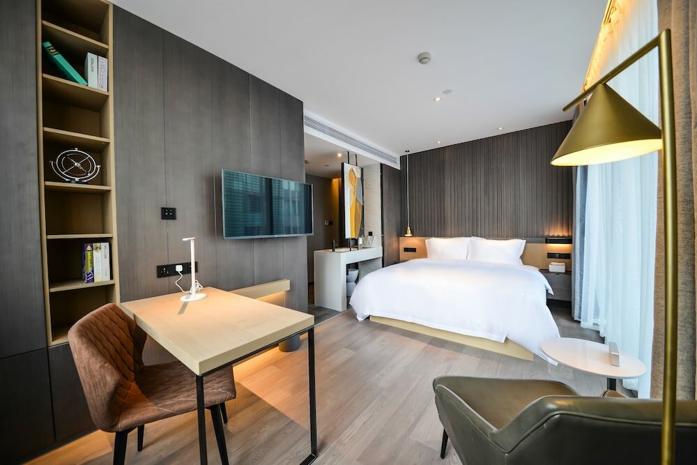 Фото Miju House Gubei-a small white building beside Shanghai oil painting sculpture institute