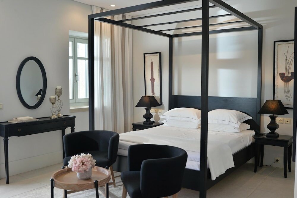 Фото Akrolithi Boutique Hotel