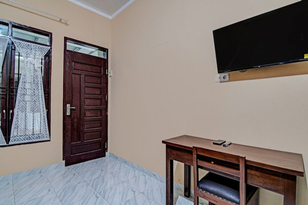 Фото Oyo 92223 Alfatar Homestay Syariah