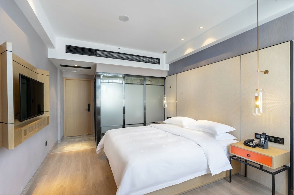 Фото Yì Wū Shì Bó Yì Měi Jū Hotel