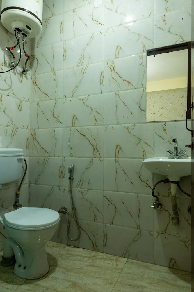 Фото Eat Sleep Wander Studio Apartments