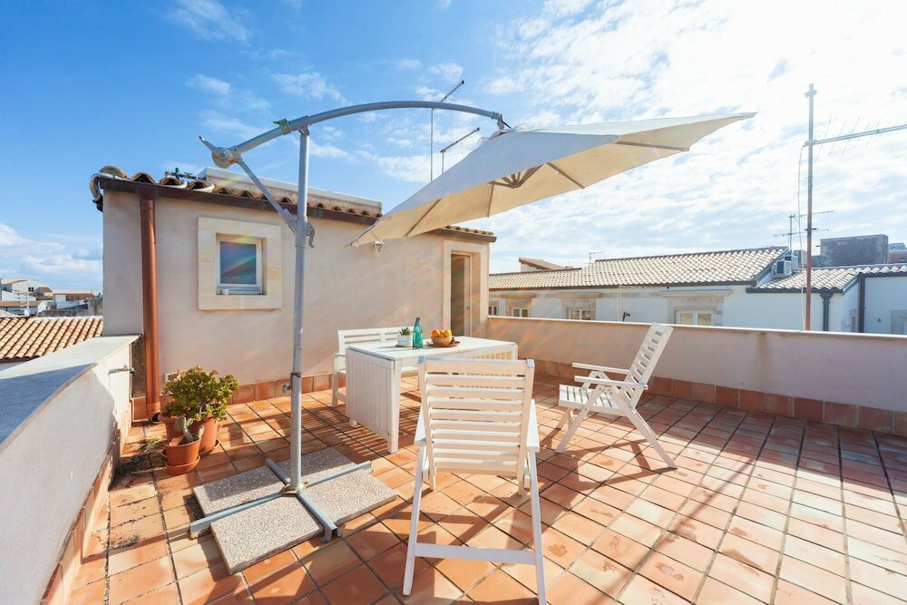 Фото Mercato di Ortigia Apartments