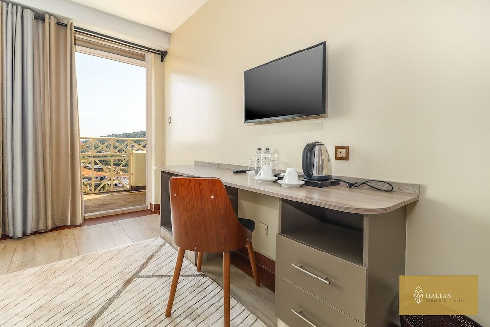 Фото Dallas Premiere Hotel