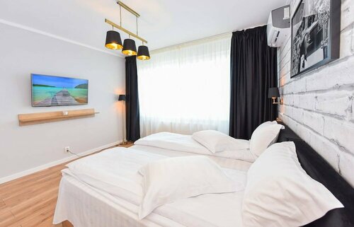 Гостиница Elite Apartment - Cismigiu Gardens в Бухаресте