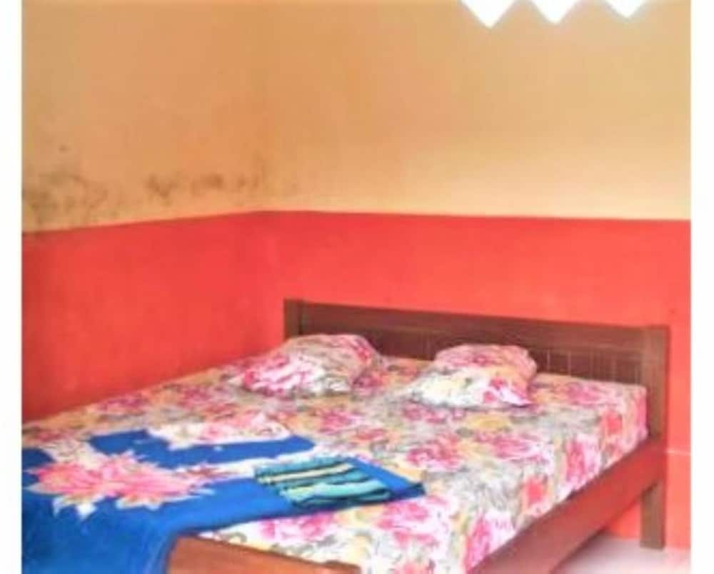 Фото Penginapan Rezeki